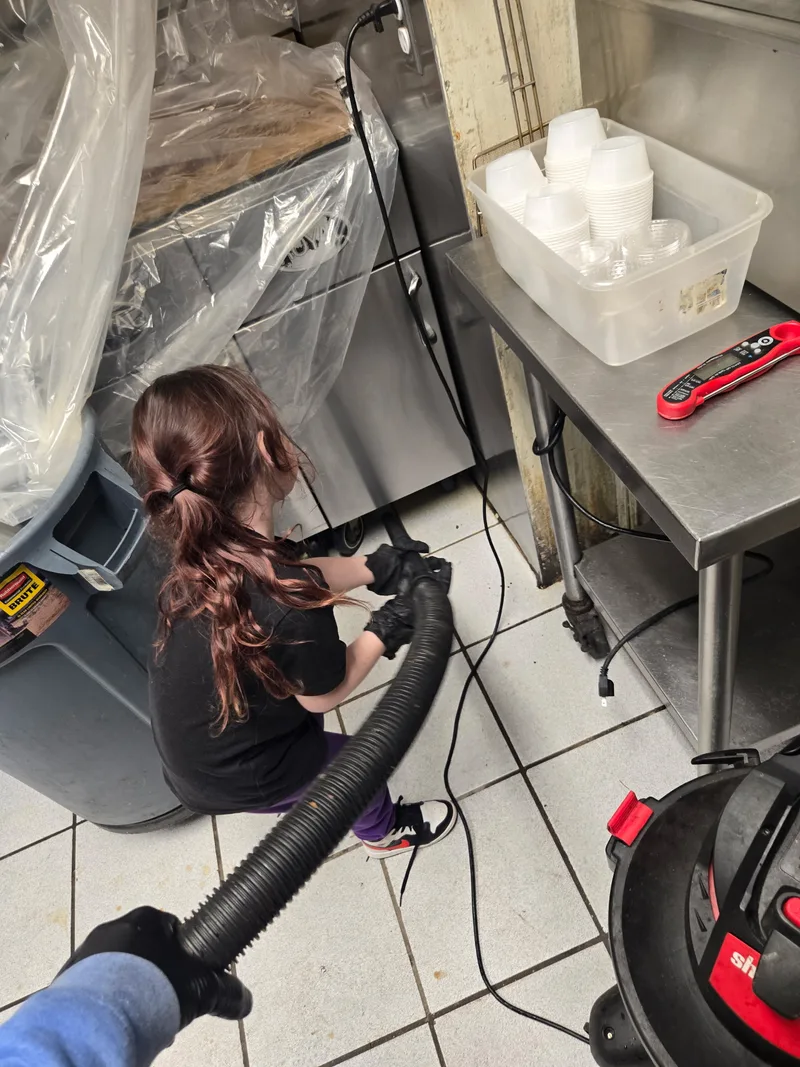 Tyler's daughter helping on a commercial kitchen cleaning job in South Jersey