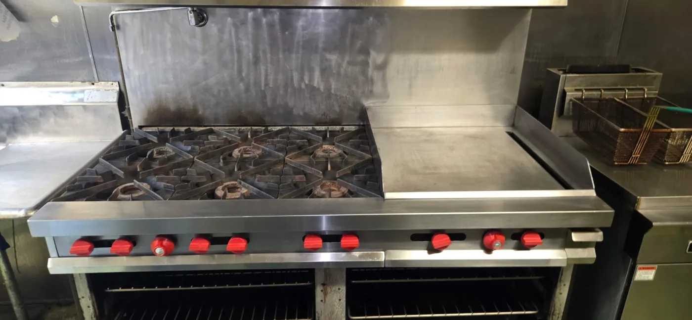 Clean commercial range and cooking line in a South Jersey restaurant kitchen after equipment cleaning